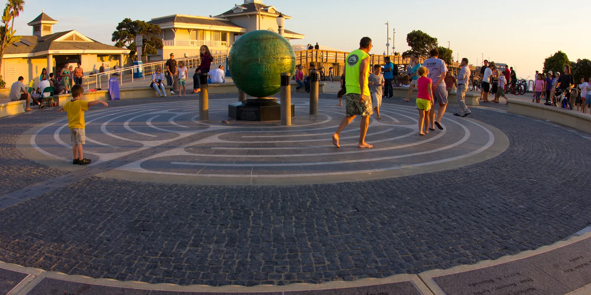 Statue with people at Newport Beach